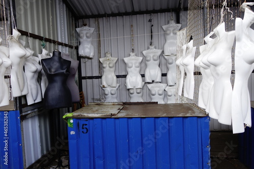 White underwear mannequins at an abandon market stall