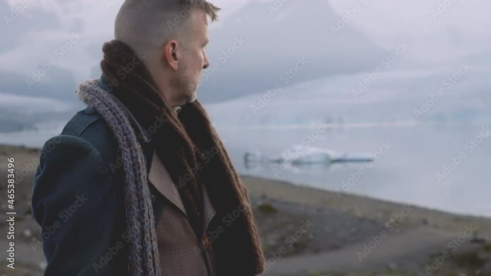 Lone Traveller Walking In Icelandic Landscape Lone Traveller Walking In Icelandic Landscape