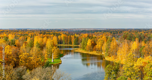 View of the autumn trees in the Gatchina park from the observation tower of the Grand Palace.