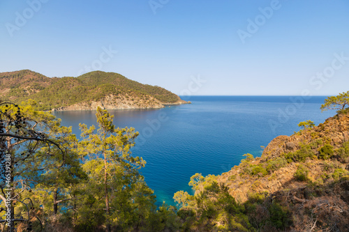 Beautiful nature landscape of Turkey coastline. View from Lycian way to small bay of Mediterrain sea. This is ancient trekking path famous among hikers. photo