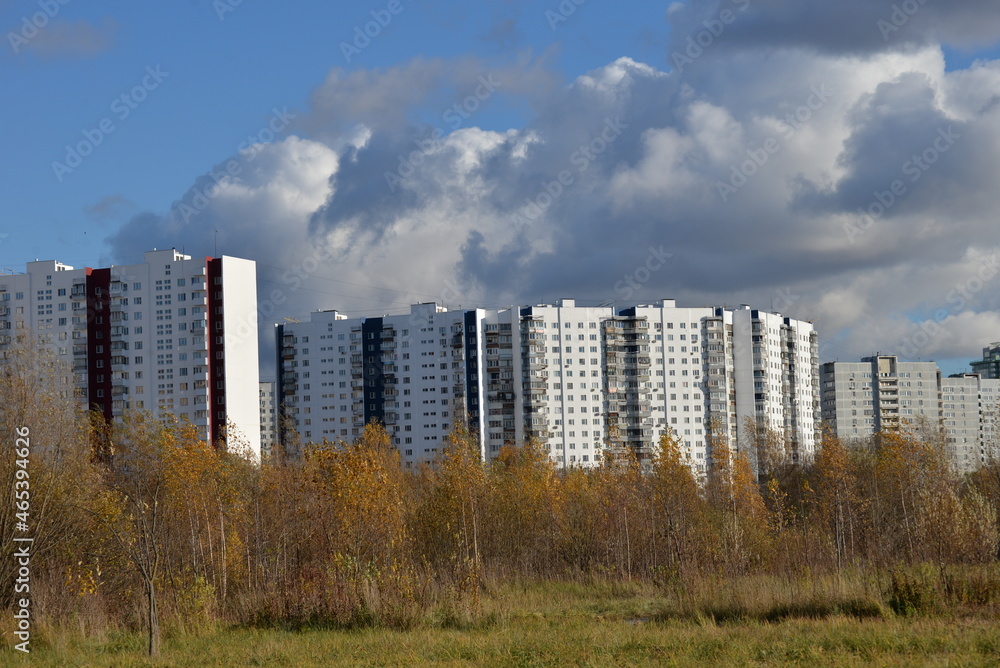 View of residential buildings from Troparevsky Park on sunny autumn day, Moscow, Russia