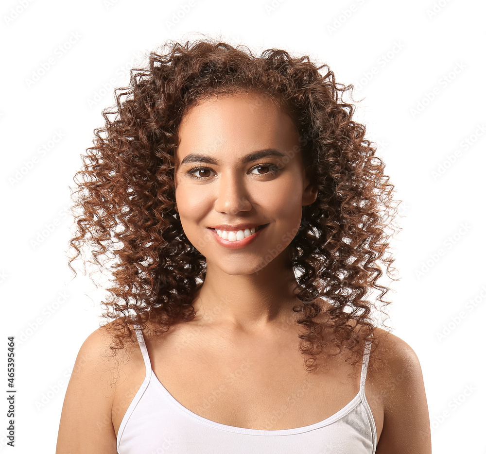 Young African-American woman with healthy hair on white background Young African-American woman with healthy hair on white background