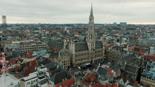 Aerial View of the Grand Place in Brussels, Belgium - most beautiful squares in Europe with Baroque architecture. Popular tourist destination and famous landmark in Bruxelles. 4K drone zoom in shot photo