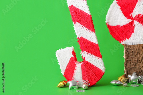 Broken candy cane piñata wi...