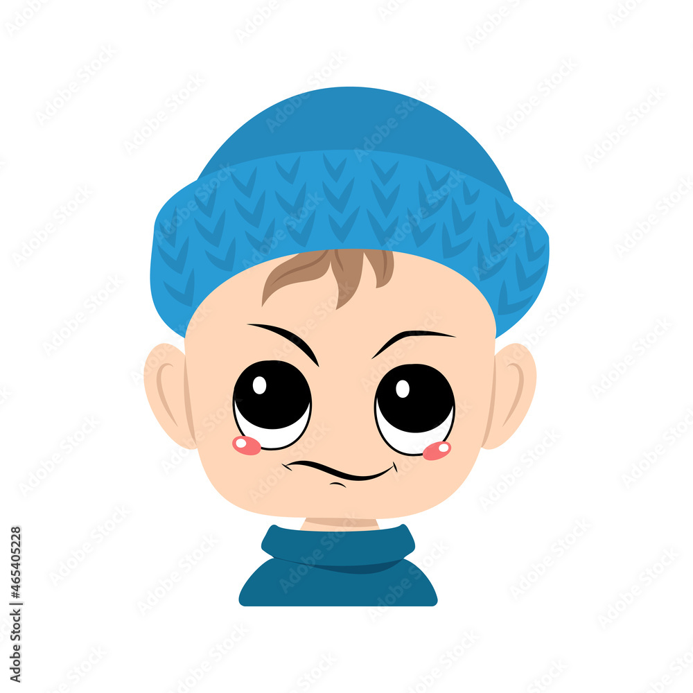 Boy with emotions of suspicious, displeased eyes in blue knitted hat. Cute kid with annoyed expression in autumnal or winter headdress. Head of adorable toddler Boy with emotions of suspicious, displeased eyes in blue knitted hat. Cute kid with annoyed expression in autumnal or winter headdress. Head of adorable toddler
