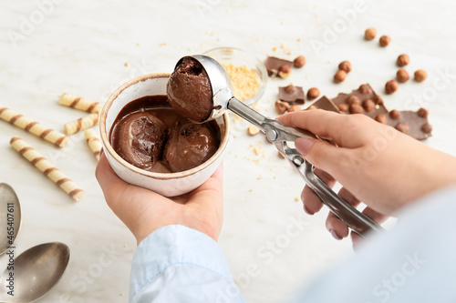 Woman preparing tasty choco...