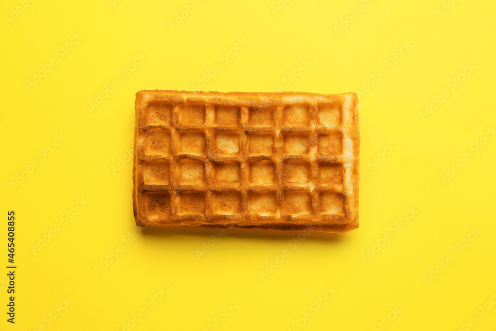 Tasty Belgian waffle on color background Tasty Belgian waffle on color background