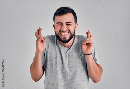 Young man in the studio on a gray background