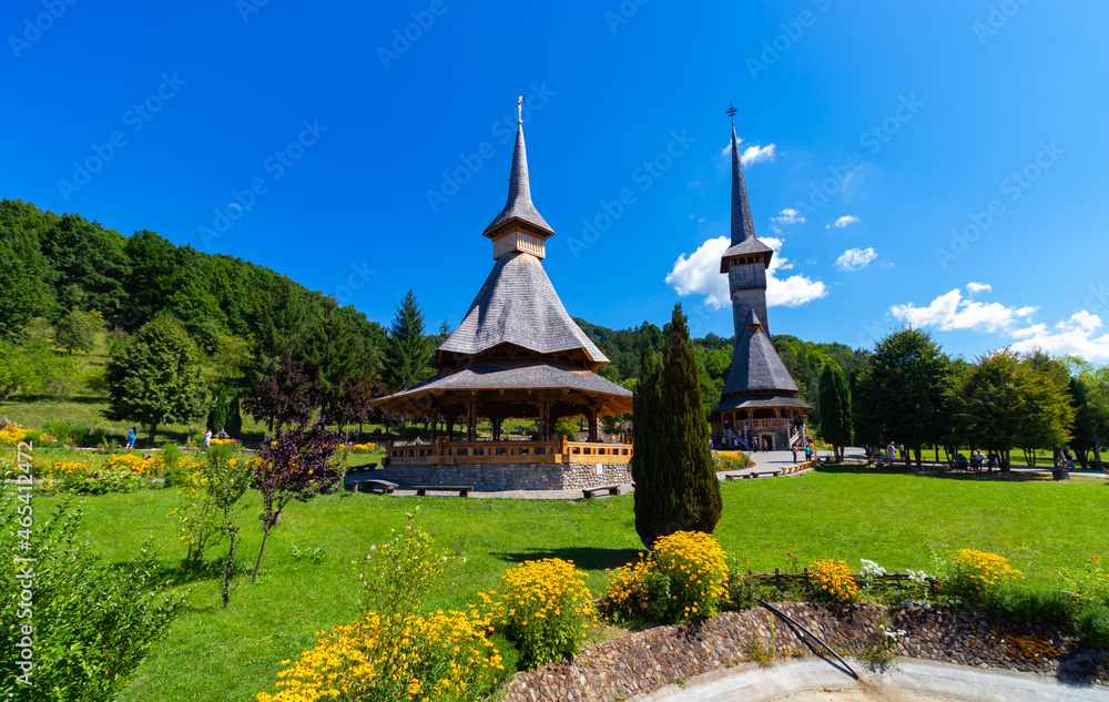 Landscape with the area of Birsana Monastery in Maramures, Romania, which has places of worship with elongated towers and traditional wooden architecture Landscape with the area of Birsana Monastery in Maramures, Romania, which has places of worship with elongated towers and traditional wooden architecture