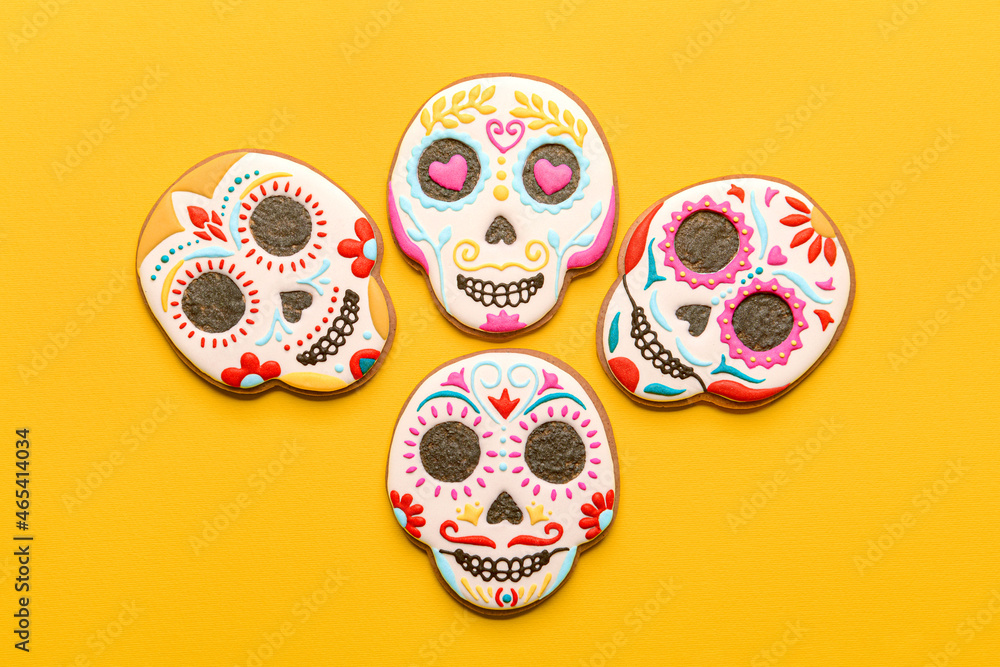 Skull shaped cookies on yellow background. El Dia de Muertos Skull shaped cookies on yellow background. El Dia de Muertos