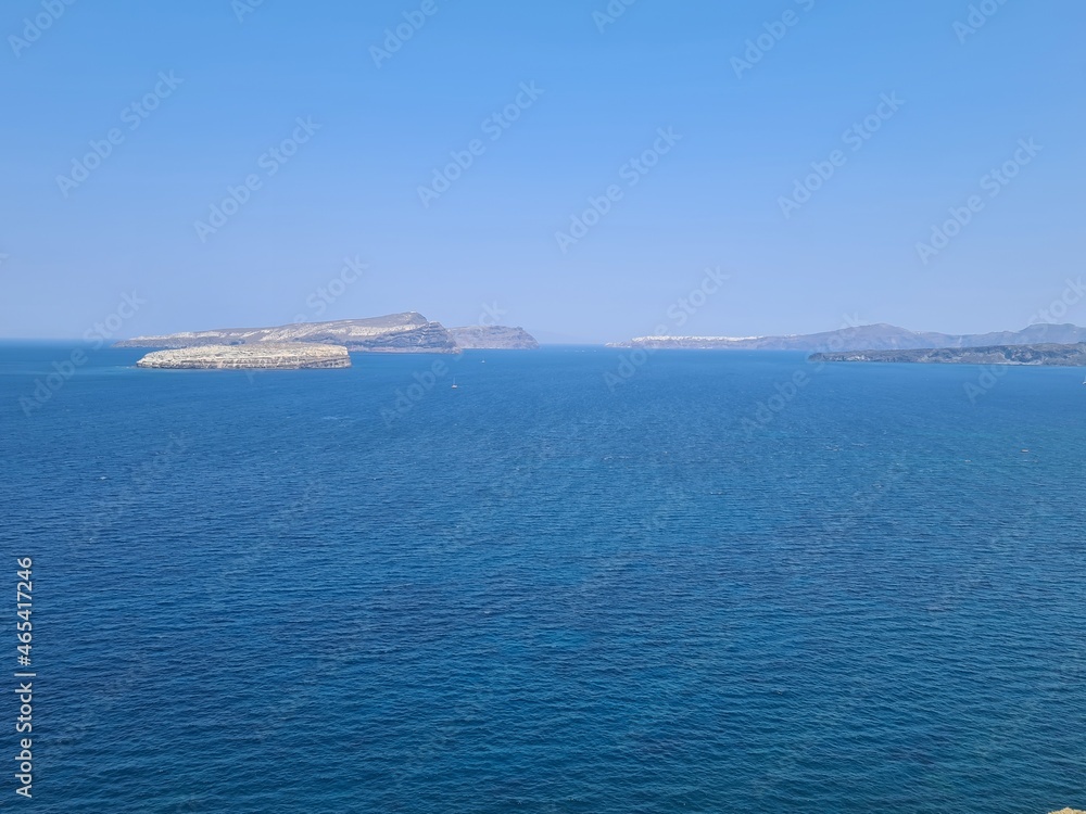 Beautiful Santorini island landscape with sea, sky and clouds. Oia town, Greece landmark in summer