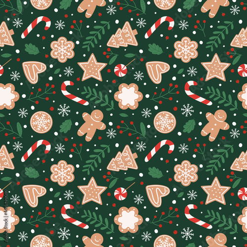 Gingerbread seamless pattern. Festive background with cookies, candies, leaves and berries.