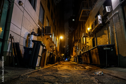 dark alleyway between buildings in major city