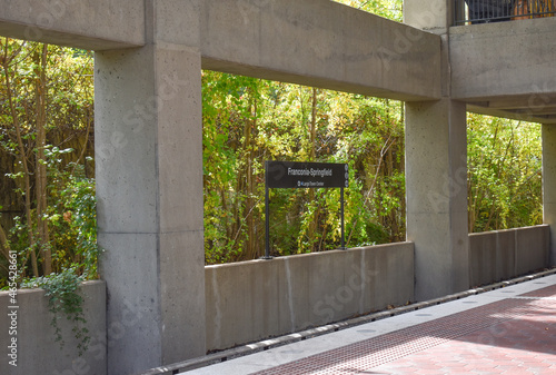 Springfield, Virginia, USA - October 25, 2021: Station Sign at the Franconia-Springfield Metro Station with an Ivy Covered Wall in the Background photo