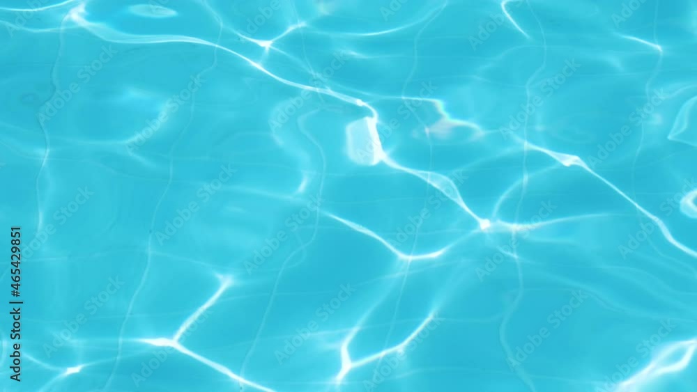 Closeup surface of blue clear water with small ripple waves in swimming pool. Closeup surface of blue clear water with small ripple waves in swimming pool.