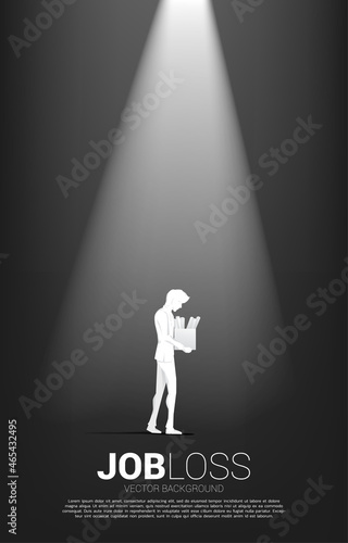 silhouette of losing job man in the spot light. Concept for depression of unemployment people.