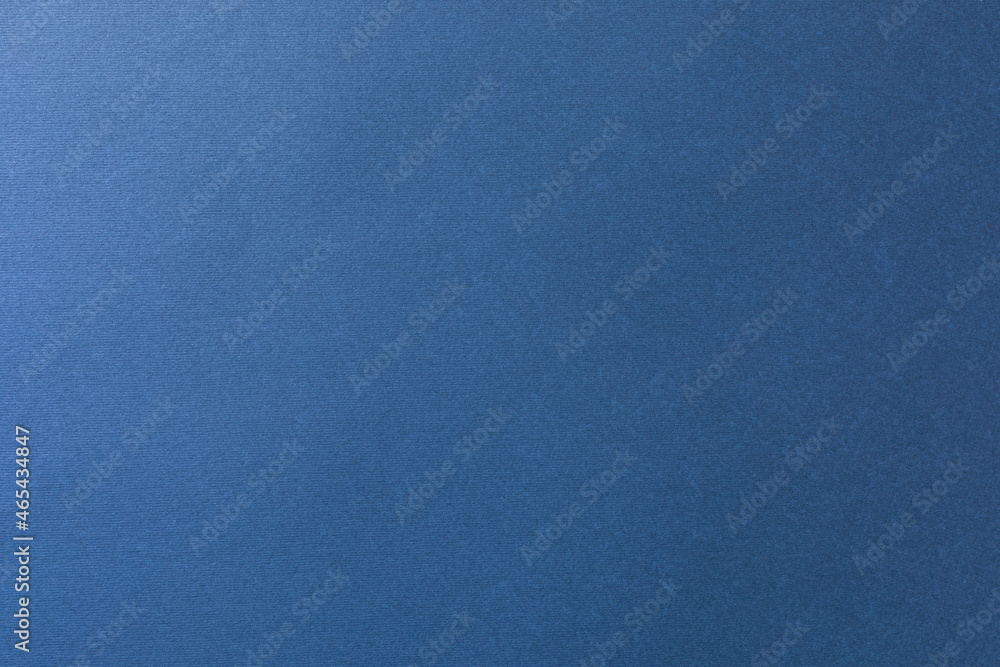 Corrugated blue cardboard background for design on an industrial, school, handmade work theme Corrugated blue cardboard background for design on an industrial, school, handmade work theme