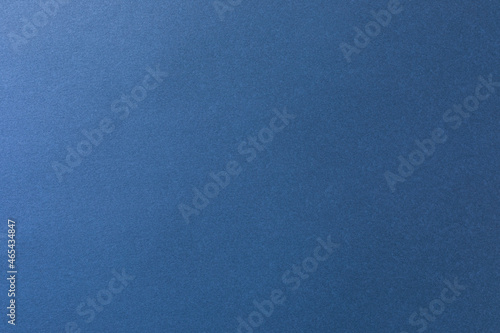 Corrugated blue cardboard background for design on an industrial, school, handmade work theme