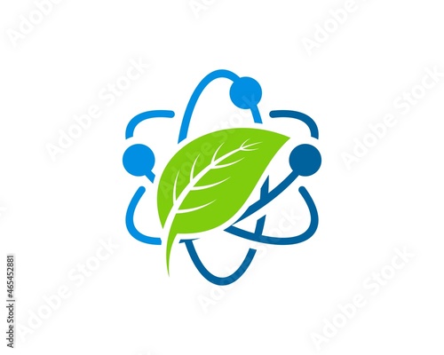 Atom symbol with green nature leaf inside