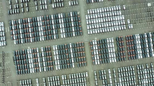 Top down view of new various cars in factory photo