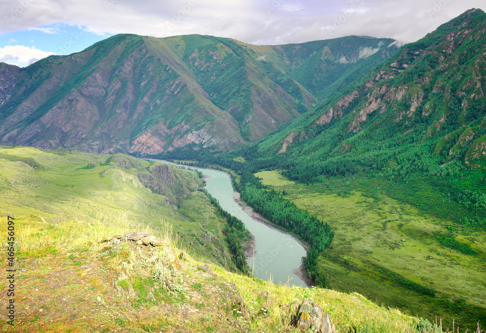 The valley of the Katun River among the mountains The valley of the Katun River among the mountains