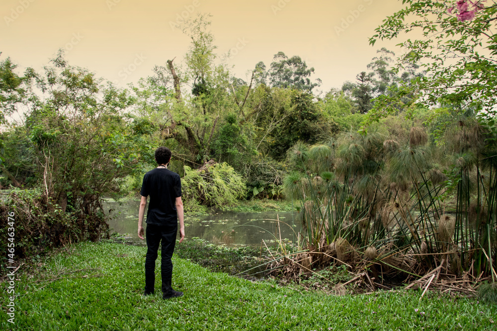 person walking in the field in Ivoti , Rio Grande do Sul person walking in the field in Ivoti , Rio Grande do Sul
