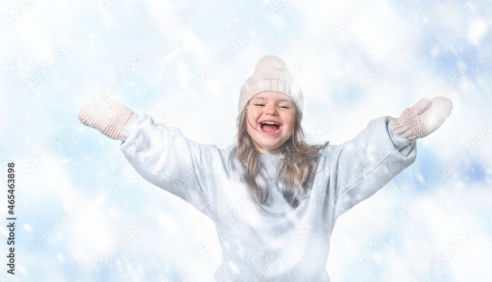 Happy child catches snow on a walk Happy child catches snow on a walk