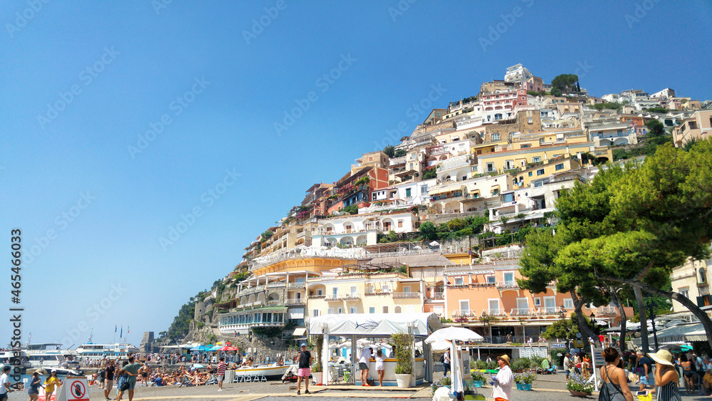 cliffside houses and gardens in the seaside holiday resort town. Italy, south of Italy - May 10, 2019