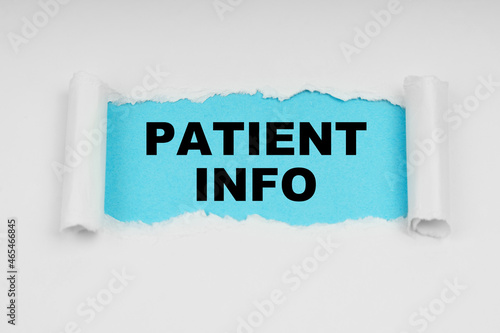 In the middle of a white sheet in space on a blue background the inscription - PATIENT INFO