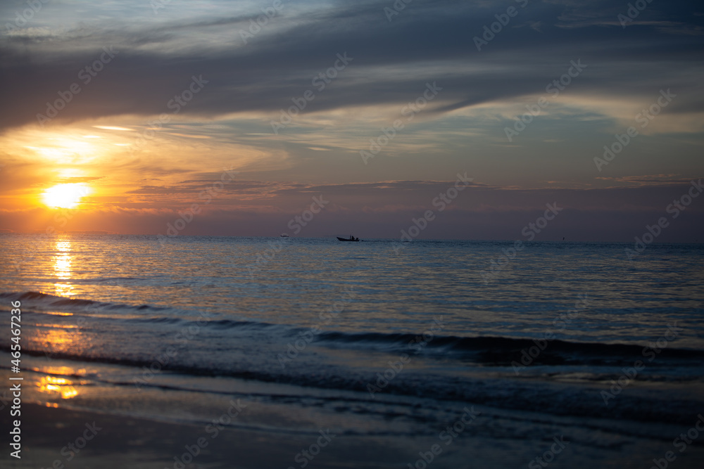 Fototapeta premium Sunrise at this beach in Thailand Orange skies and beautiful sandy beaches