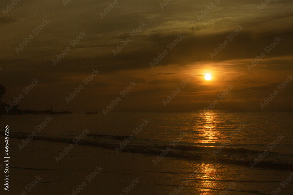Sunrise at this beach in Thailand Orange skies and beautiful sandy beaches