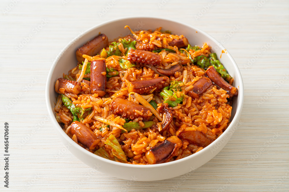 Stir-fried squid or octopus with Korean spicy sauce rice bowl Stir-fried squid or octopus with Korean spicy sauce rice bowl