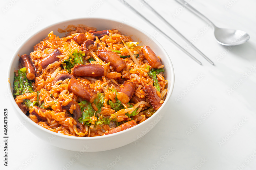 Stir-fried squid or octopus with Korean spicy sauce rice bowl Stir-fried squid or octopus with Korean spicy sauce rice bowl