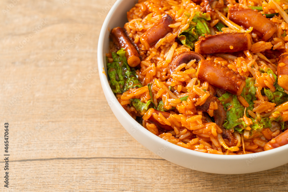 Stir-fried squid or octopus with Korean spicy sauce rice bowl Stir-fried squid or octopus with Korean spicy sauce rice bowl