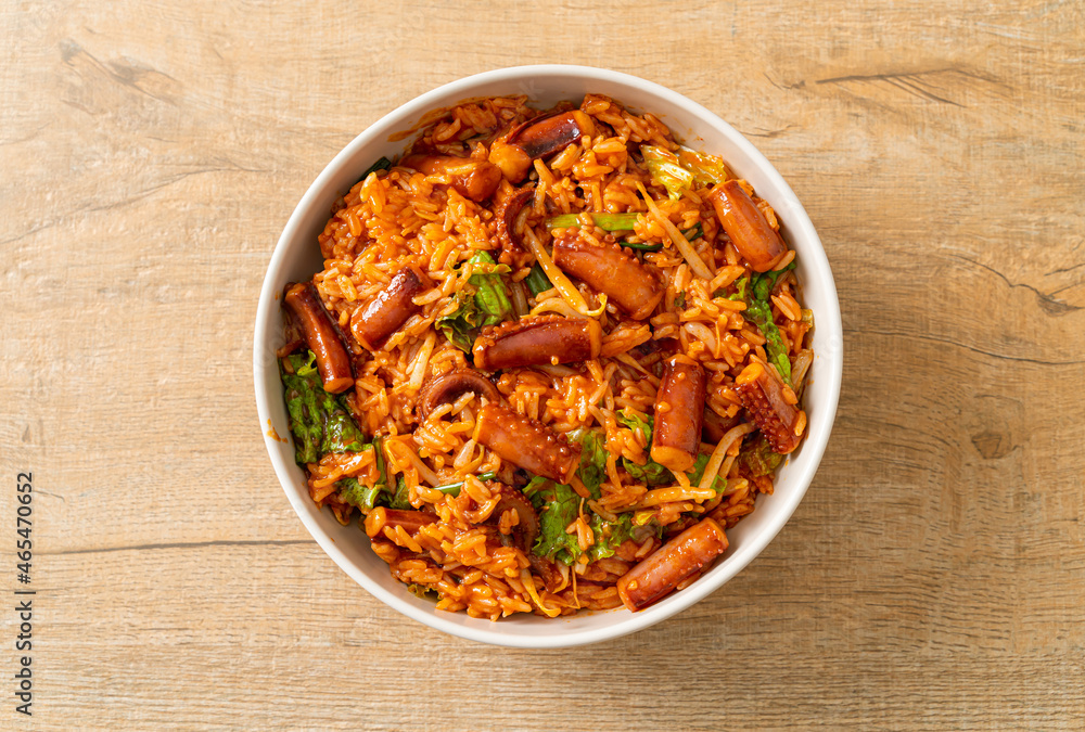 Stir-fried squid or octopus with Korean spicy sauce rice bowl Stir-fried squid or octopus with Korean spicy sauce rice bowl