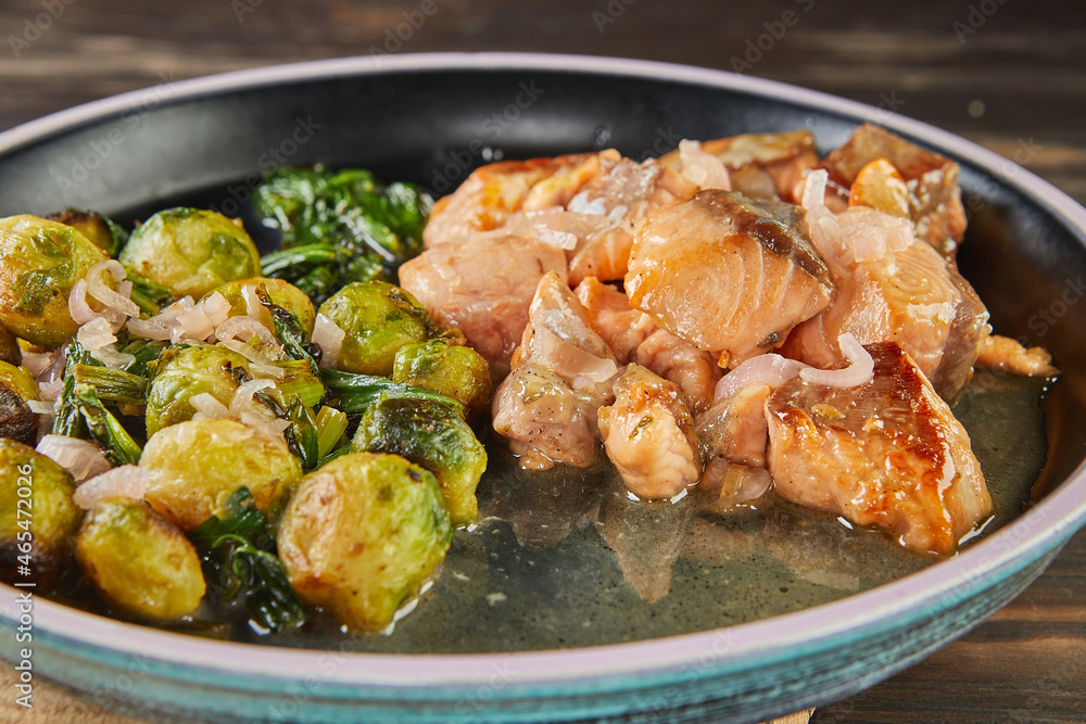 Norwegian Salmon with Brussels Sprouts and Bok Choy Cabbage. French gourmet cuisine Norwegian Salmon with Brussels Sprouts and Bok Choy Cabbage. French gourmet cuisine