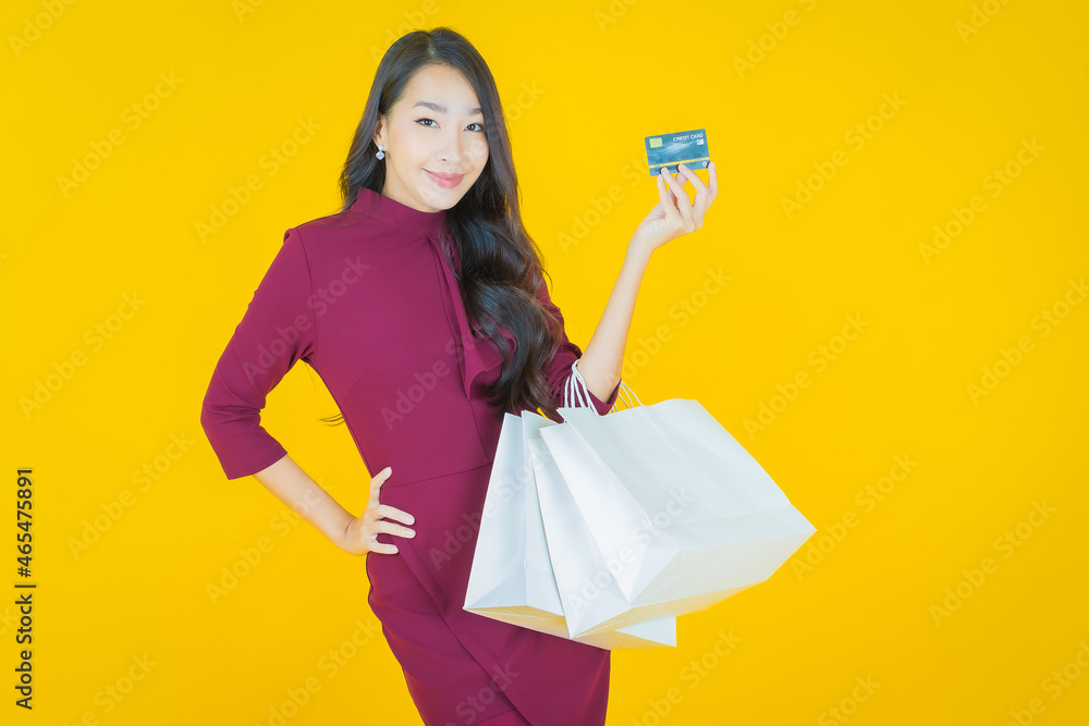 Portrait beautiful young asian woman smile with shopping bag Portrait beautiful young asian woman smile with shopping bag