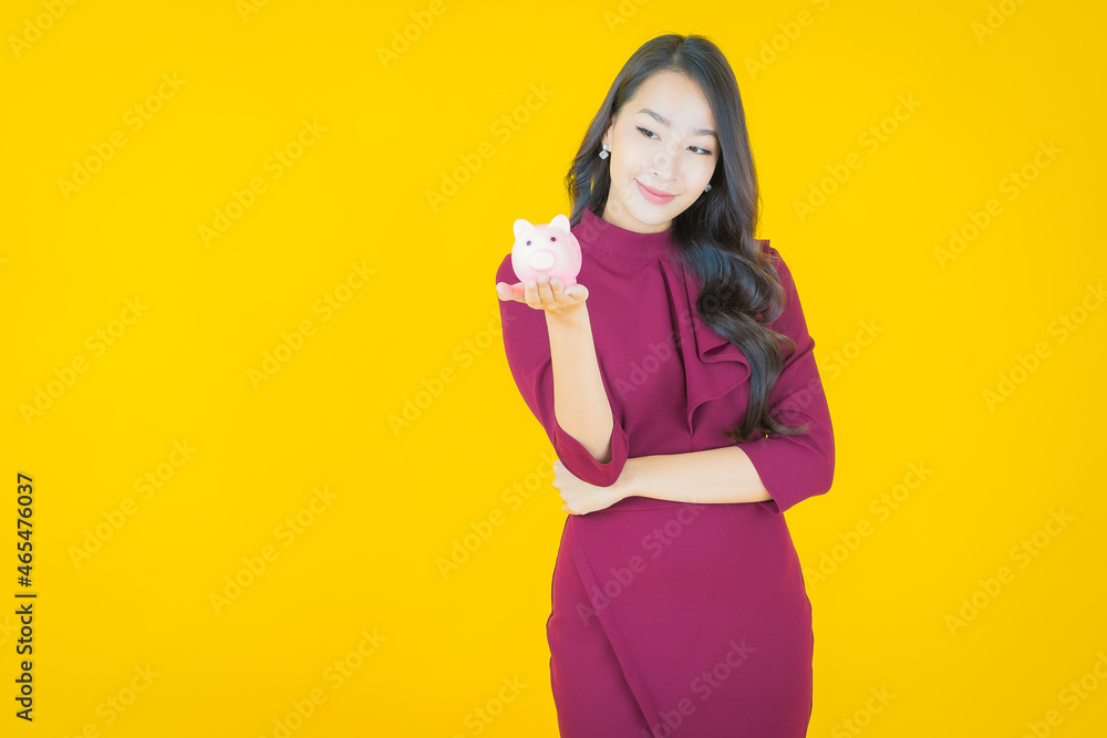 Portrait beautiful young asian woman with piggy bank Portrait beautiful young asian woman with piggy bank