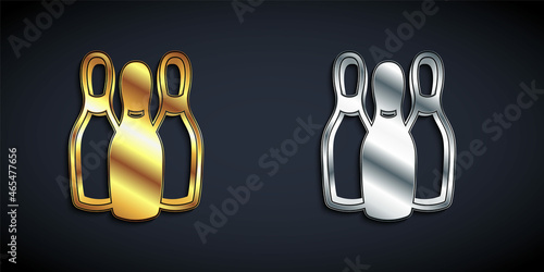 Gold and silver Bowling pin icon isolated on black background. Juggling clubs, circus skittles. Long shadow style. Vector