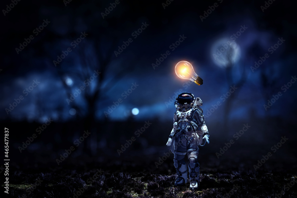 Astronaut walking on an unexplored planet Astronaut walking on an unexplored planet