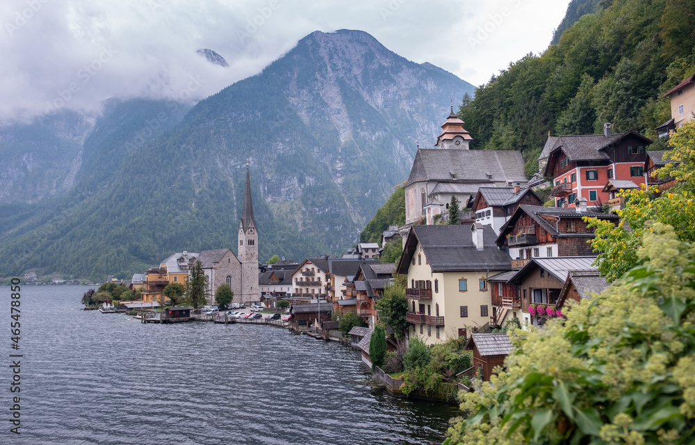 Scenic picture-postcard view of the historic Hallstatt, mountain small town in the Austrian Alps in a cloudy autumn day. UNESCO word heritage site.