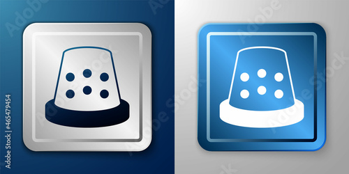 White Thimble for sewing icon isolated on blue and grey background. Silver and blue square button. Vector