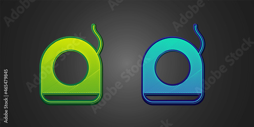 Green and blue Dental floss icon isolated on black background. Vector