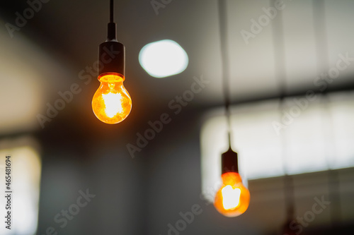 Light bulbs hanging from the ceiling, coffee lighting decoration ideas.