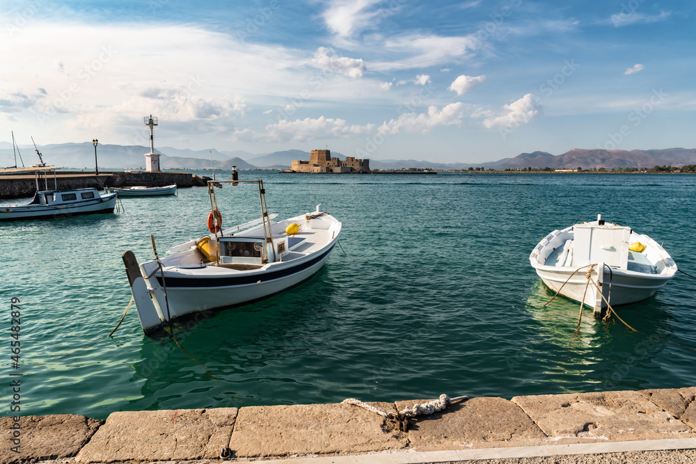 The boats are moored in the bay of Nafplion