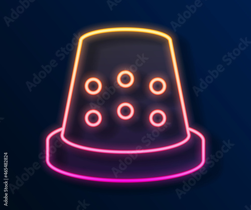 Glowing neon line Thimble for sewing icon isolated on black background. Vector