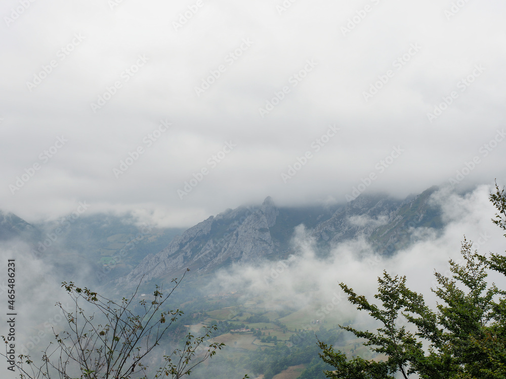 A valley of Asturias in the mist, Spain