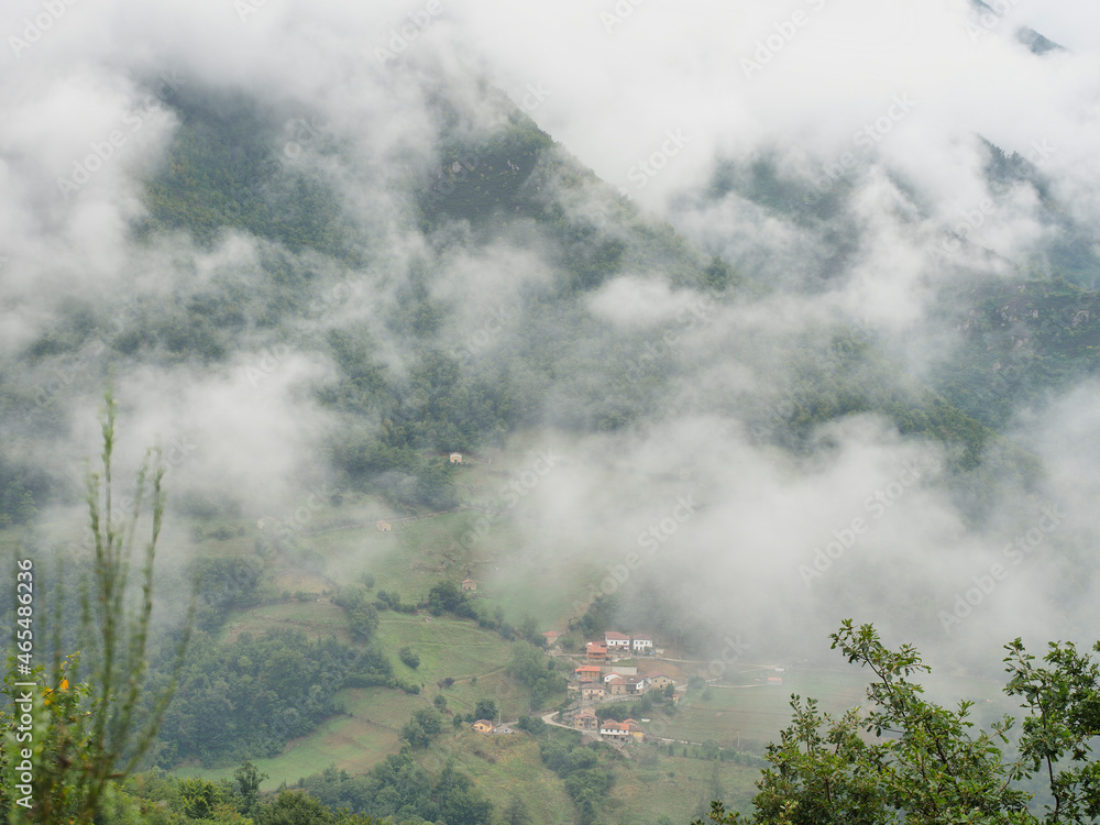 A valley of Asturias in the mist, Spain