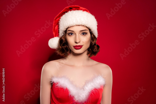 Photo of charming female model wear santa claus costume new year party isolated on red color background