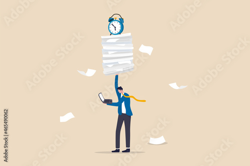 Ability to work under pressure, leadership skill to success, control stressed complete work within timeline concept, calm confident businessman working with laptop while carrying load of paperwork.